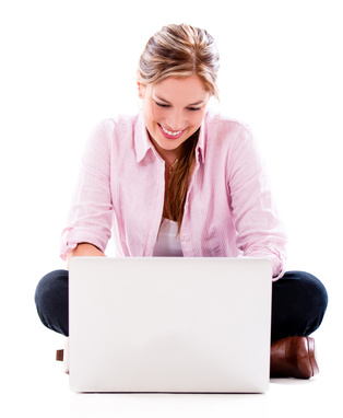 Woman writing on laptop